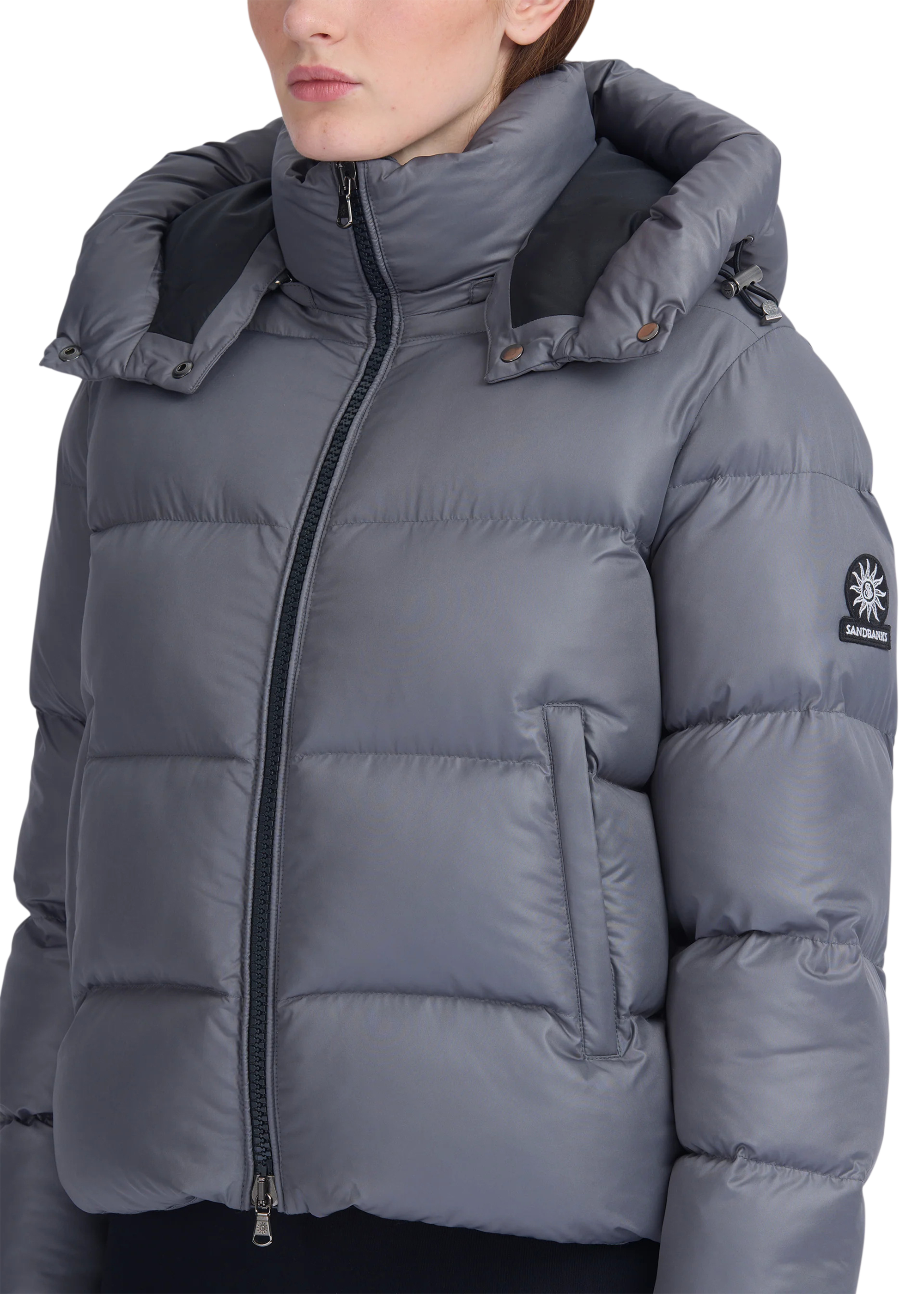 Gray puffer jacket with a brand logo on a white background