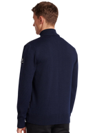 Man wearing a navy blue sweater on a white background