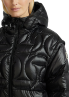 Black puffer jacket with a hood on a white background