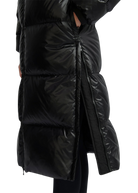 Black puffer coat on a white background