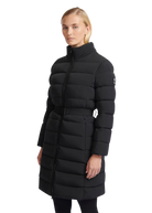 Woman wearing a black puffer coat on a white background