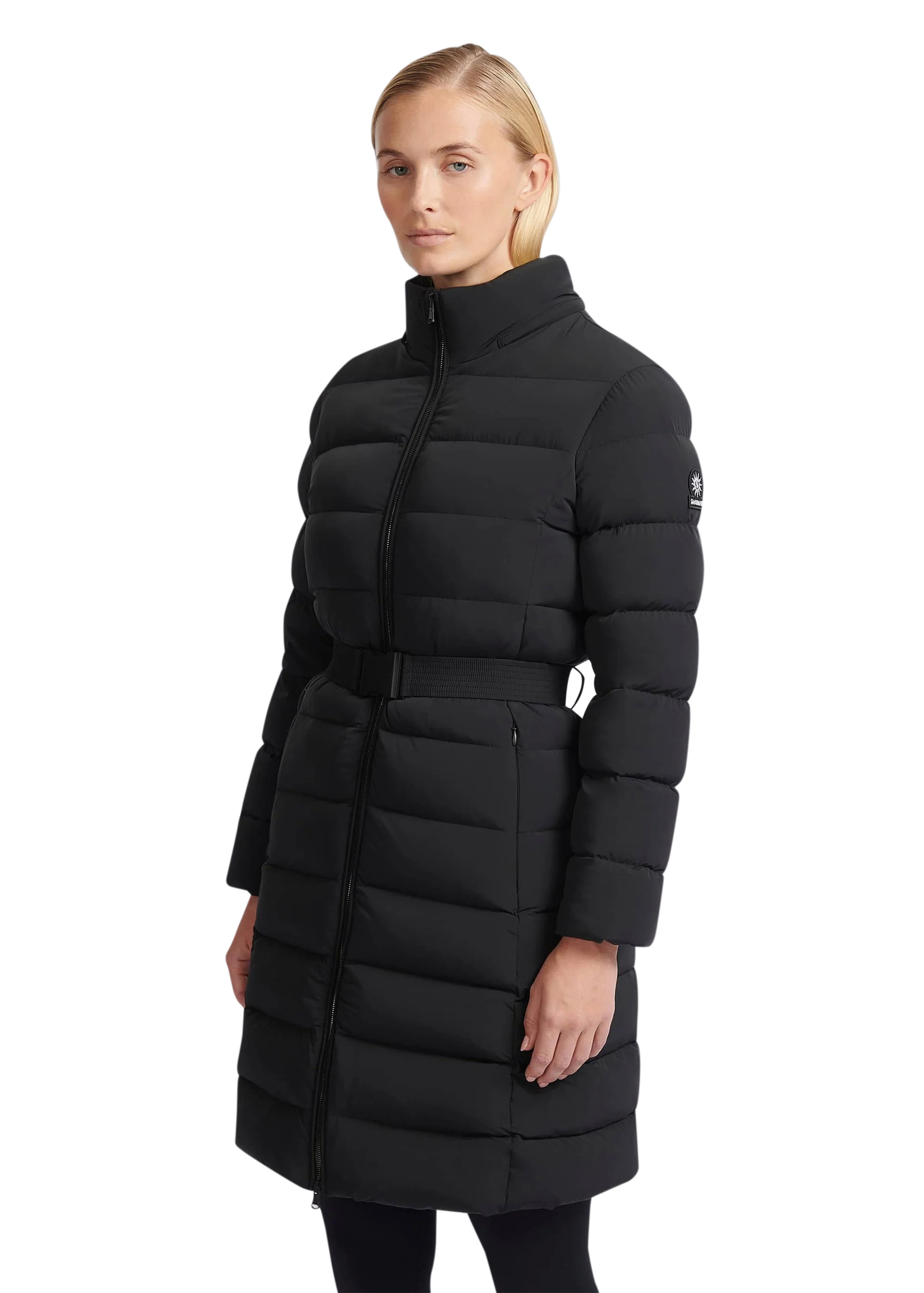 Woman wearing a black puffer coat on a white background