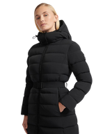 Woman wearing a black puffer jacket on a white background