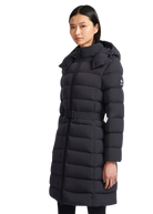Woman wearing a black puffer coat on a white background